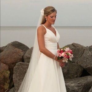 Like new, only worn once, David’s Bridal Gown